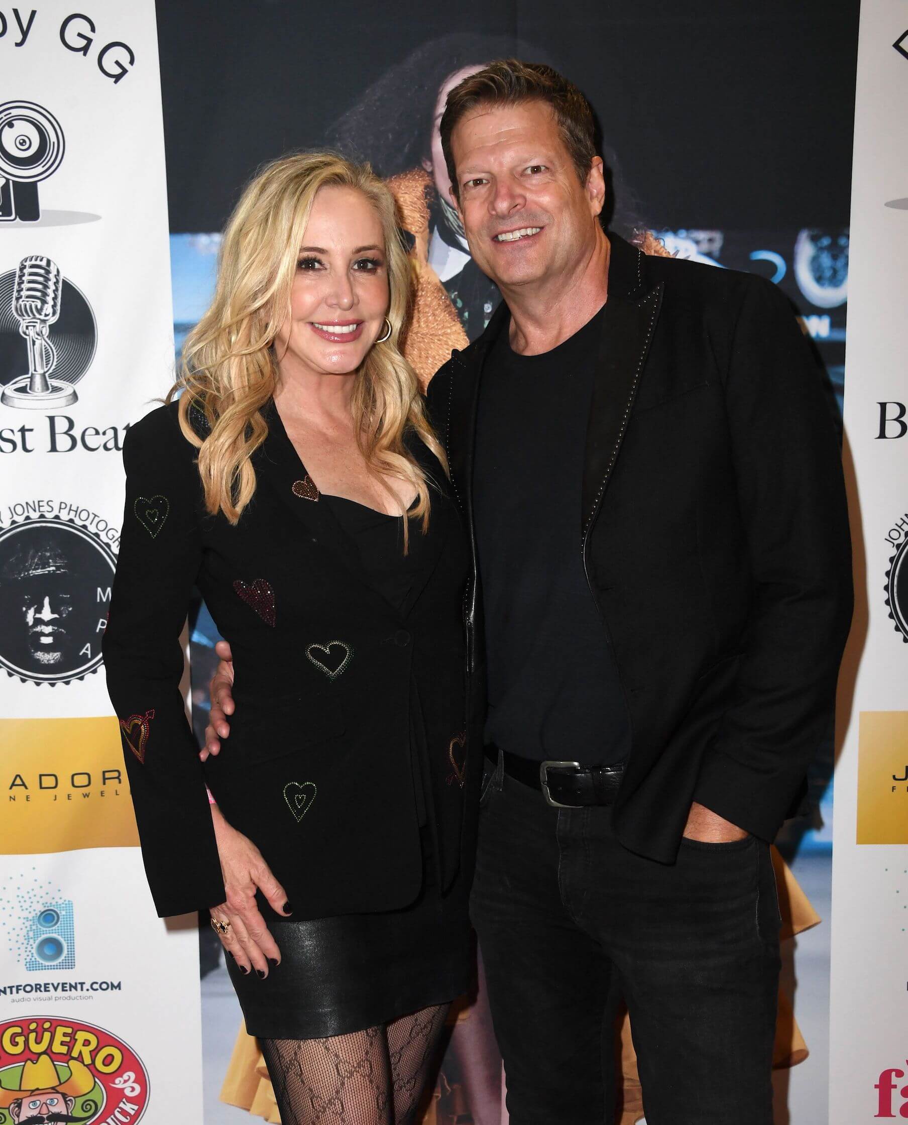 'The Real Housewives of Orange County' stars Shannon Beador and John Janssen smiling with their arms around each other