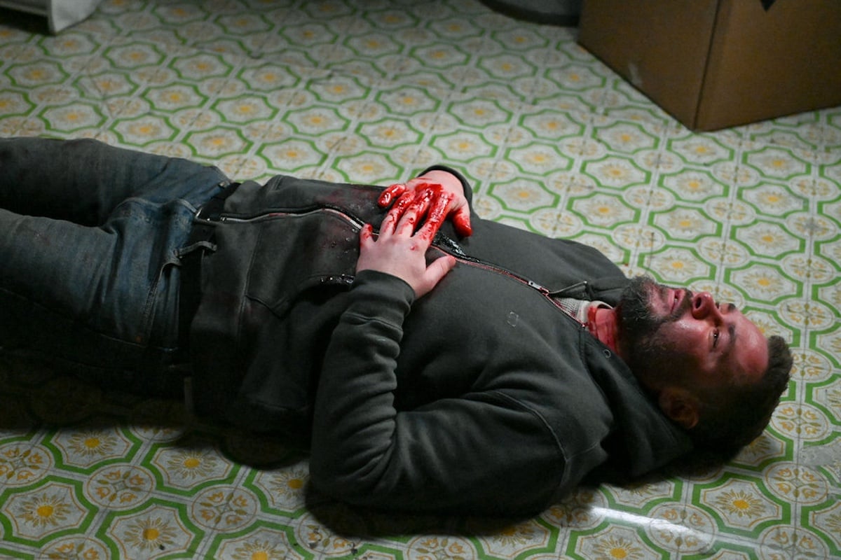 A wounded, bloody Ruzek on the floor in 'Chicago P.D.'