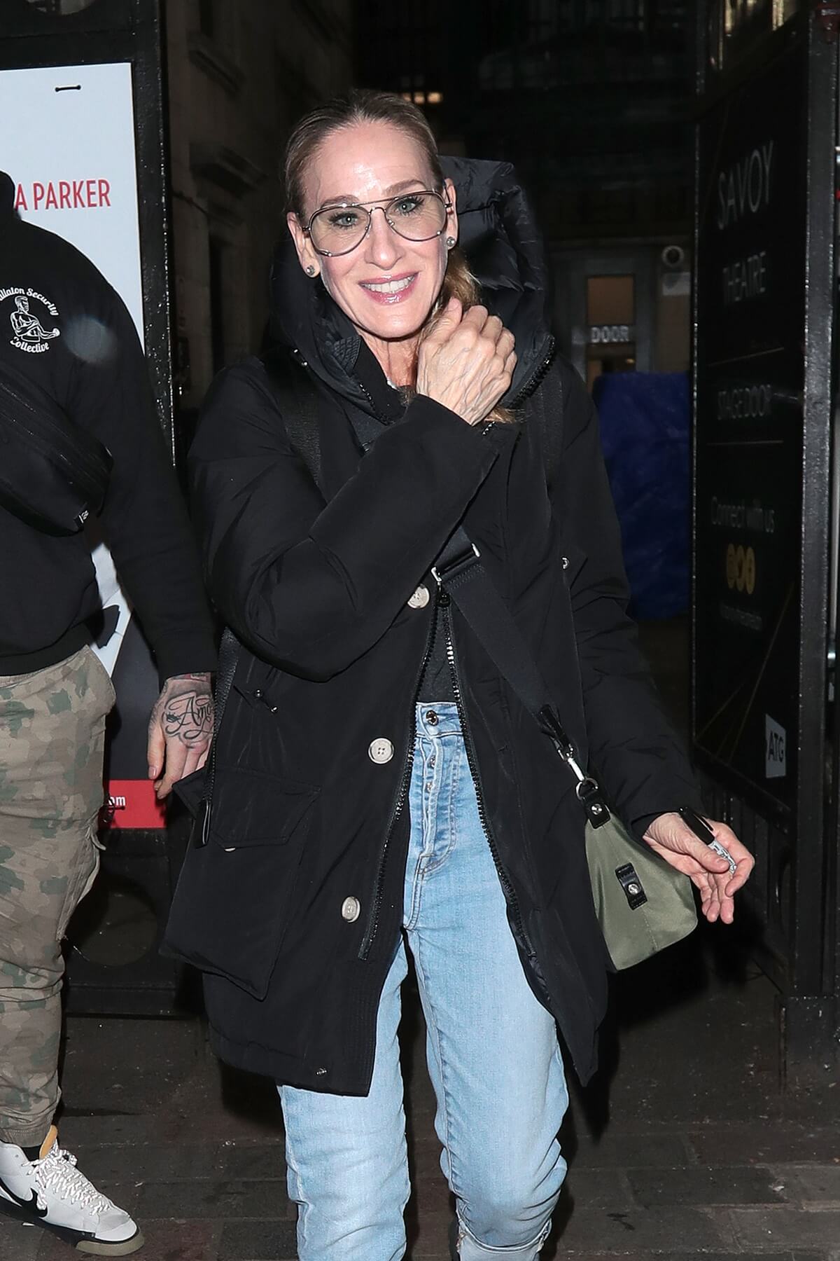 Sarah Jessica Parker seen at Savoy Theatre after her performance in "Plaza Suite" wearing a black coat.