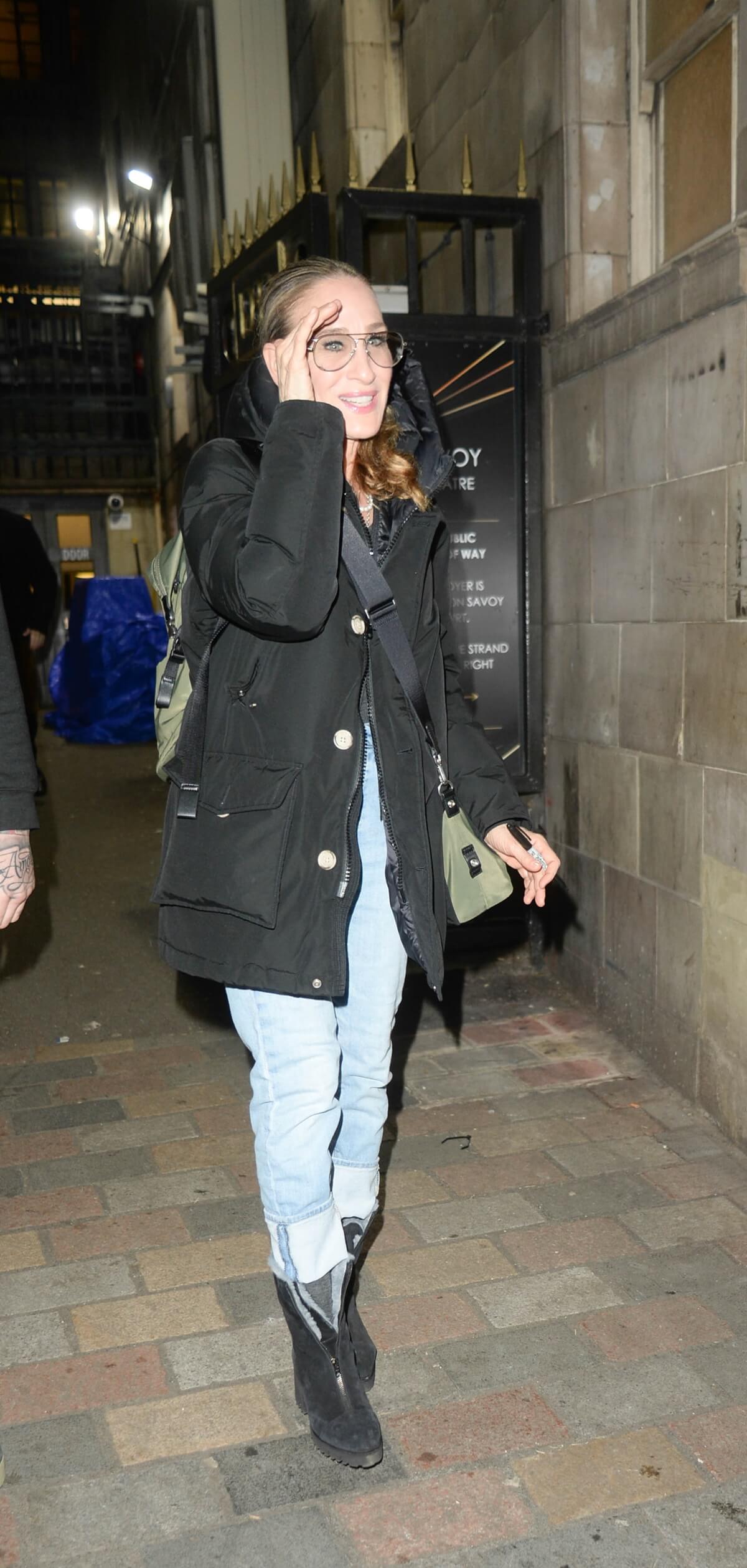 Sarah Jessica Parker seen at Savoy Theatre after her performance in "Plaza Suite" wearing a black coat.