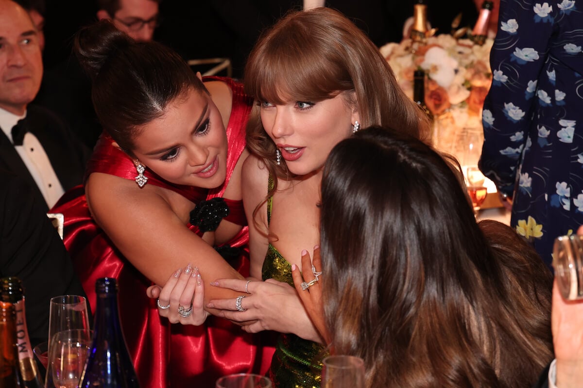 Selena Gomez wraps her arms around Taylor Swift at the 2024 Golden Globes