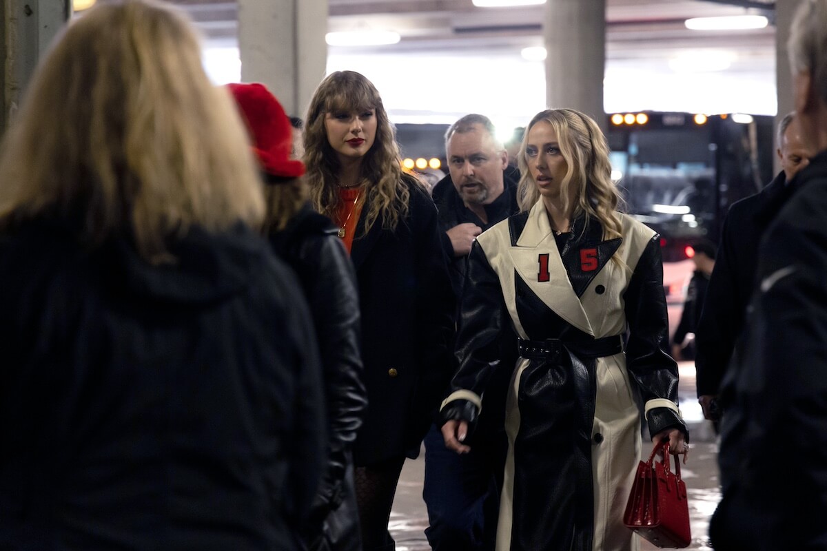 Taylor Swift and Brittany Mahomes walking into M&T Bank Stadium