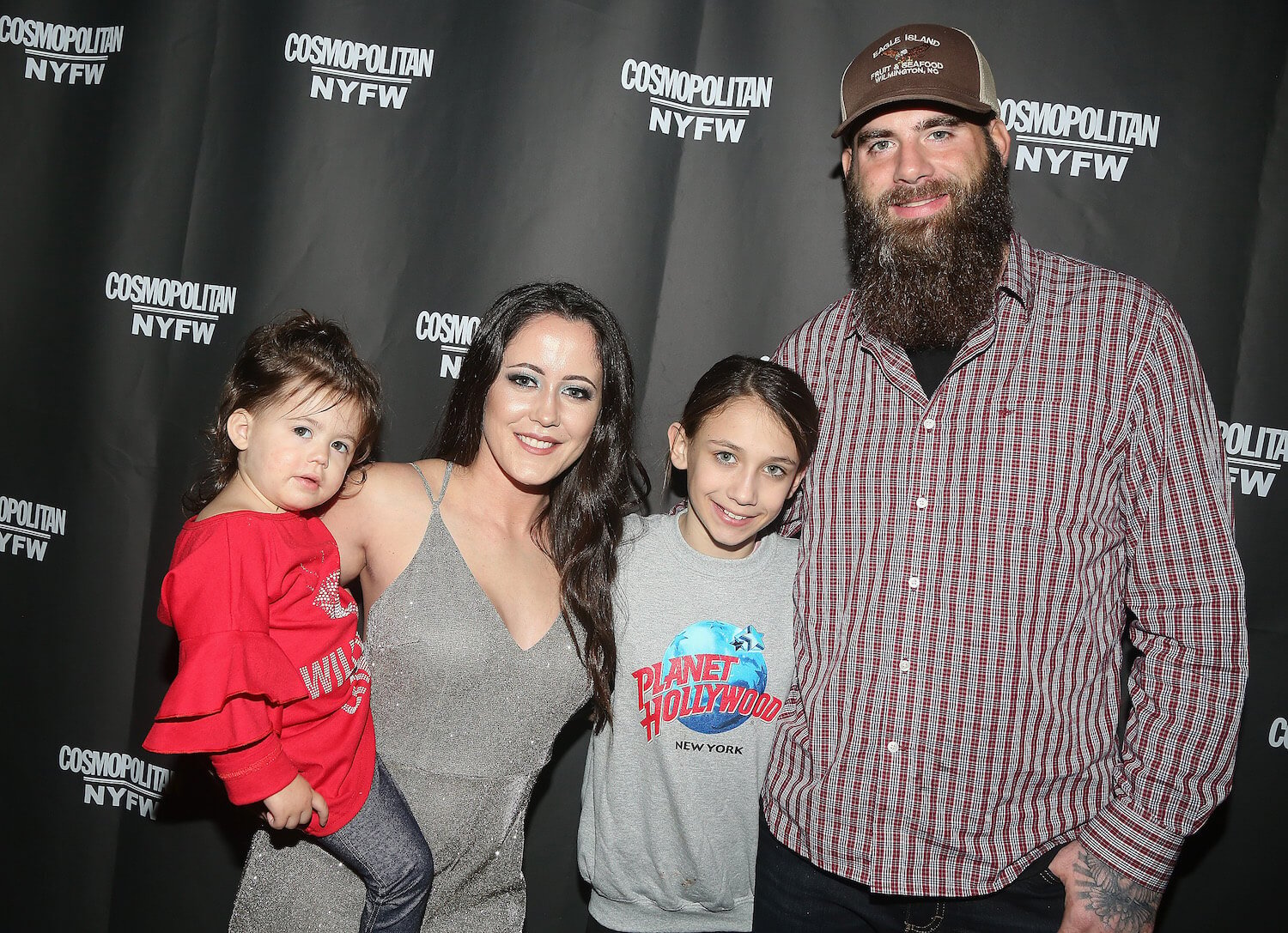 Ensley Jolie Eason, 'Teen Mom 2' star Janelle Evans, Maryssa Eason, and David Eason standing next to each other and smiling at an event
