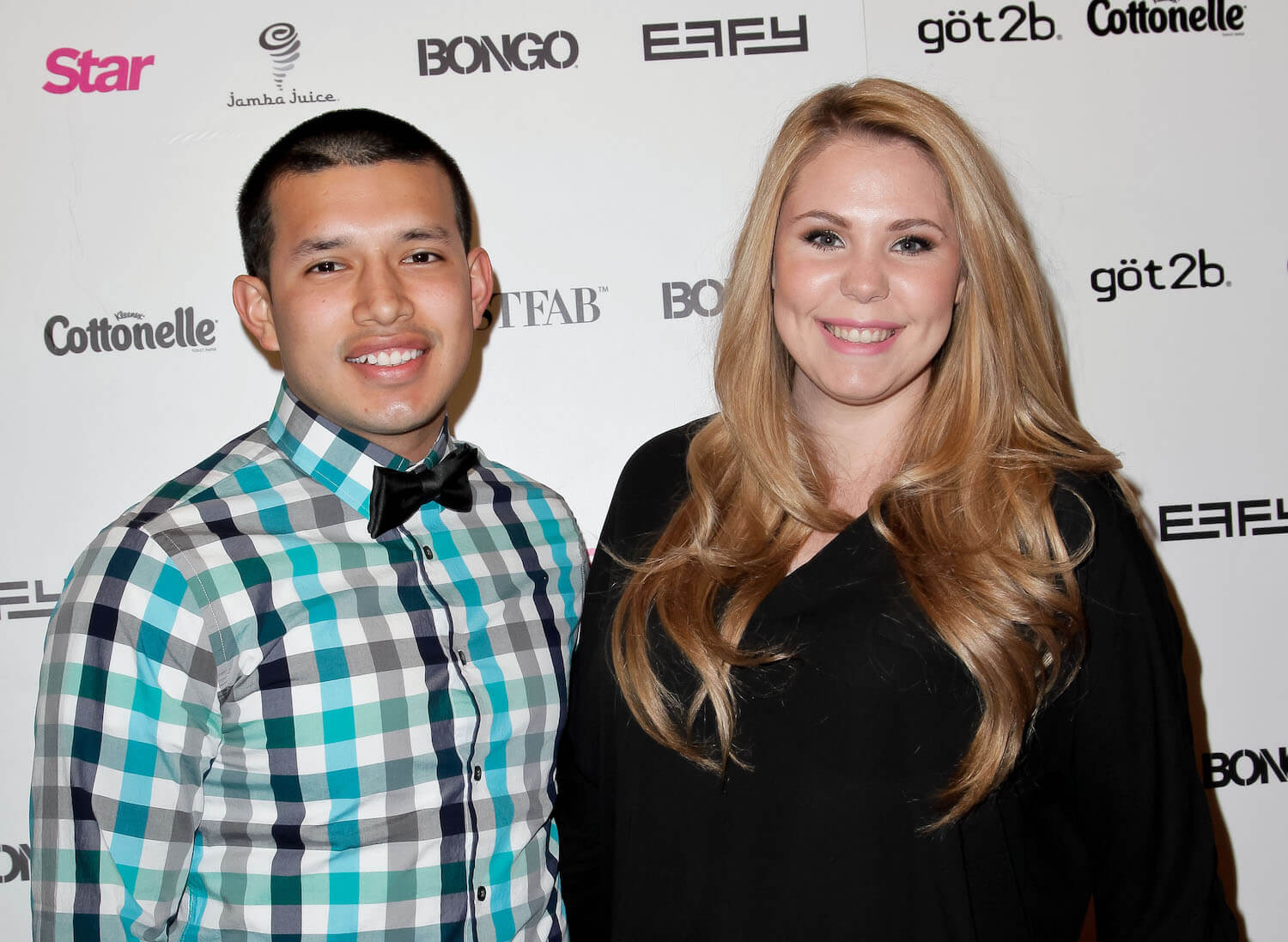 Javi Marroquin and 'Teen Mom 2' star Kailyn Lowry  standing side by side and smiling at an event