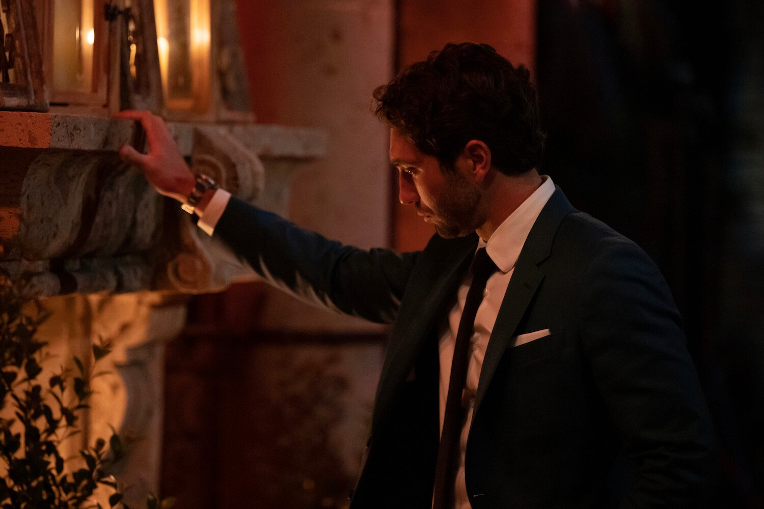 Joey Graziadei standing in front of a fireplace during 'The Bachelor' 2024 premiere