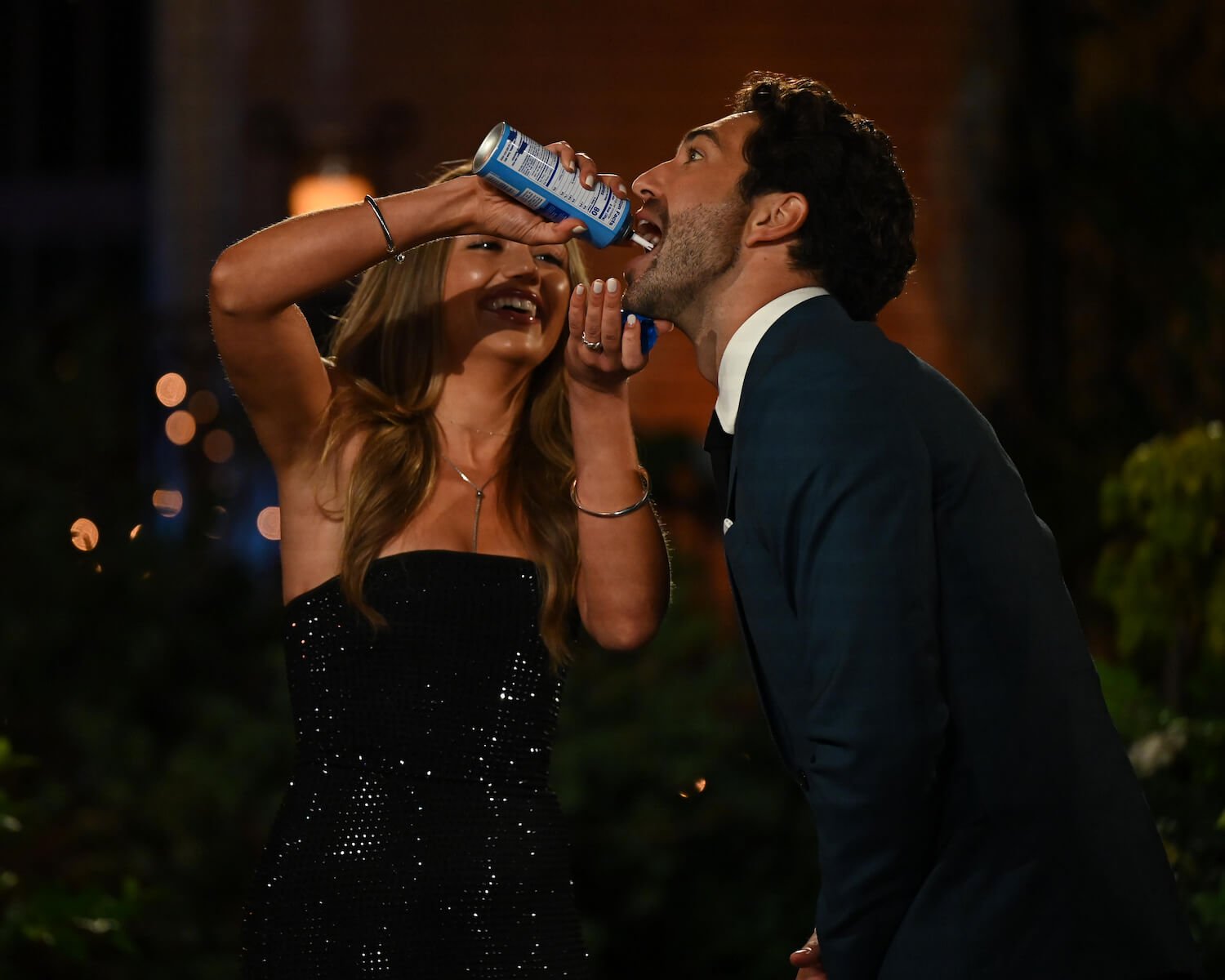 'The Bachelor' Season 28 lead Joey Graziadei getting canned cheese sprayed into his mouth by a contestant during the premiere