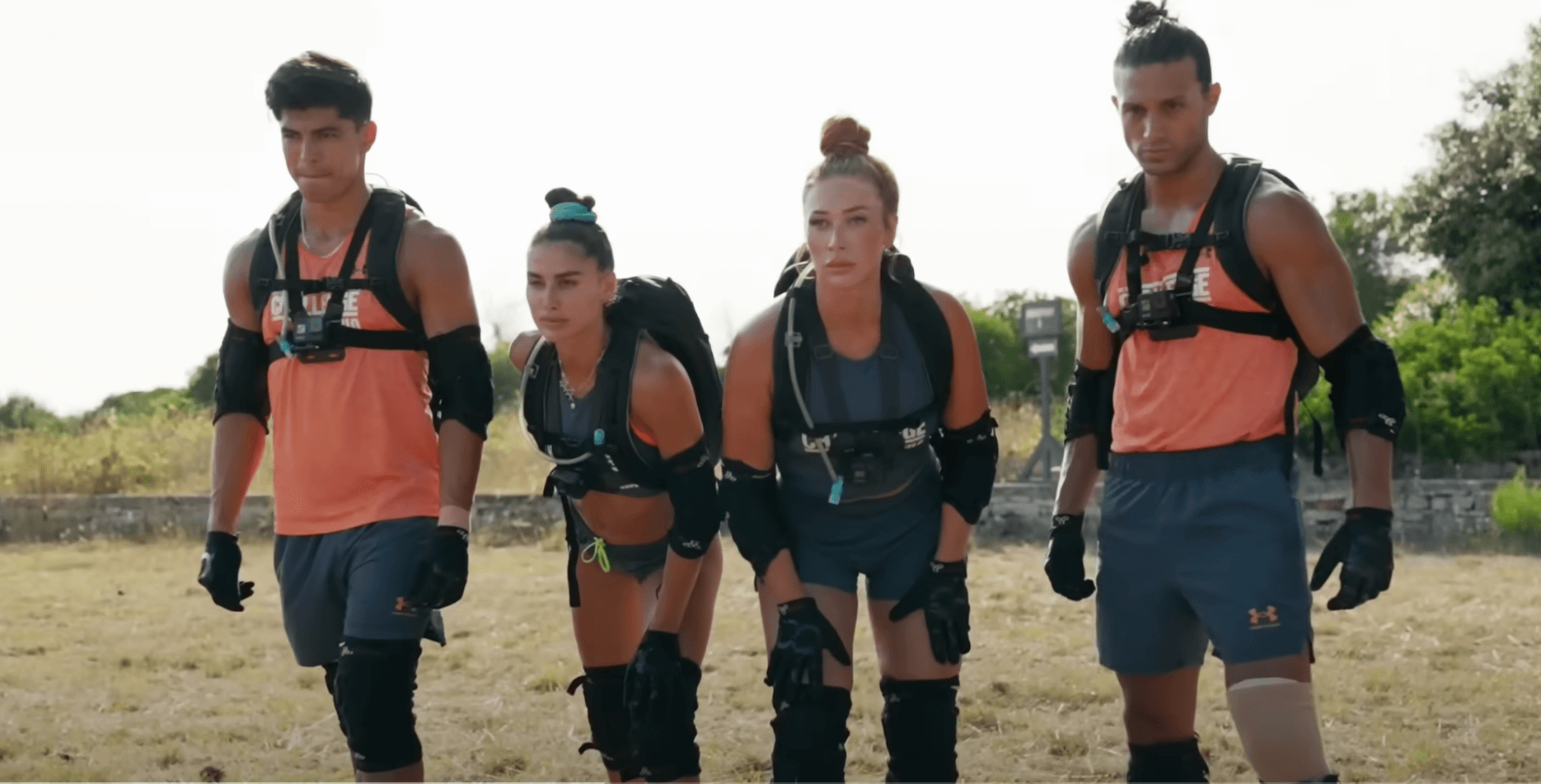 MTV's 'The Challenge' Season 39 promo showing 4 competitors dressed in orange in a field ready to start a challenge