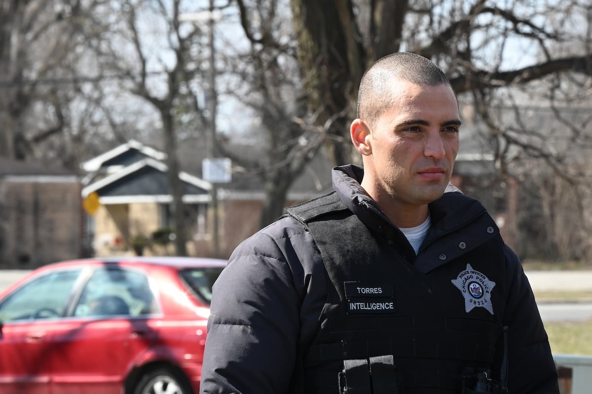 Benjamin Levy Aguilar as Dante Torres, wearing a bulletproof vest, in 'Chicago P.D.'