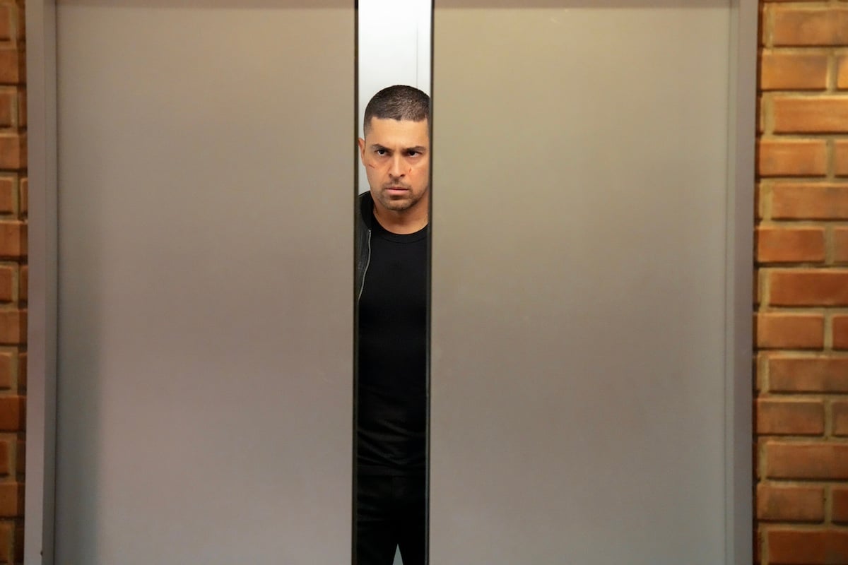 Torres standing in an elevator as doors open in the 'NCIS' Season 21 premiere