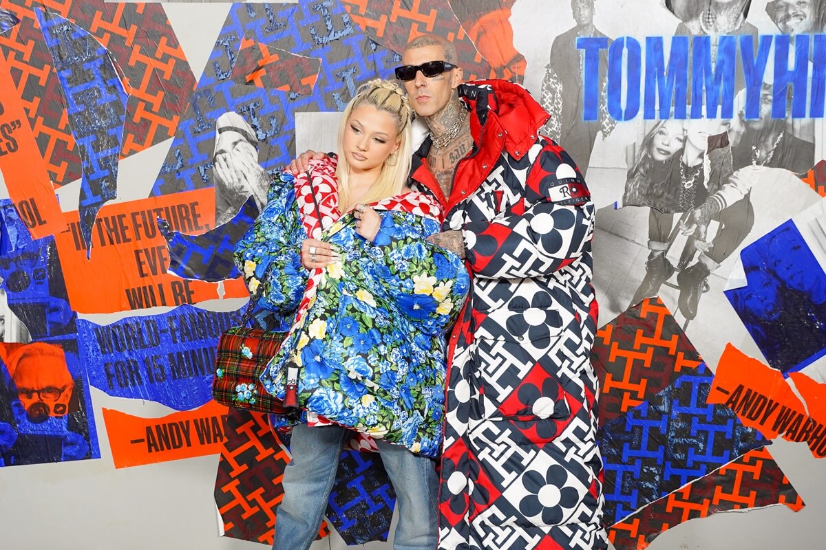 Trav is Barker posing next to daughter Alabama Barker at the Tommy Hilfiger Fall 22 NYFW Experience during New York Fashion Week.