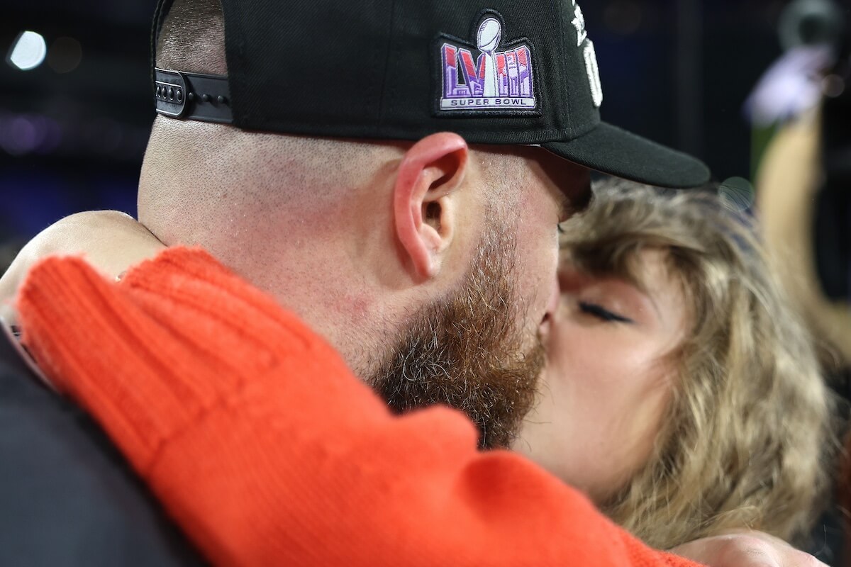 Close up of Travis Kelce and Taylor Swift kissing