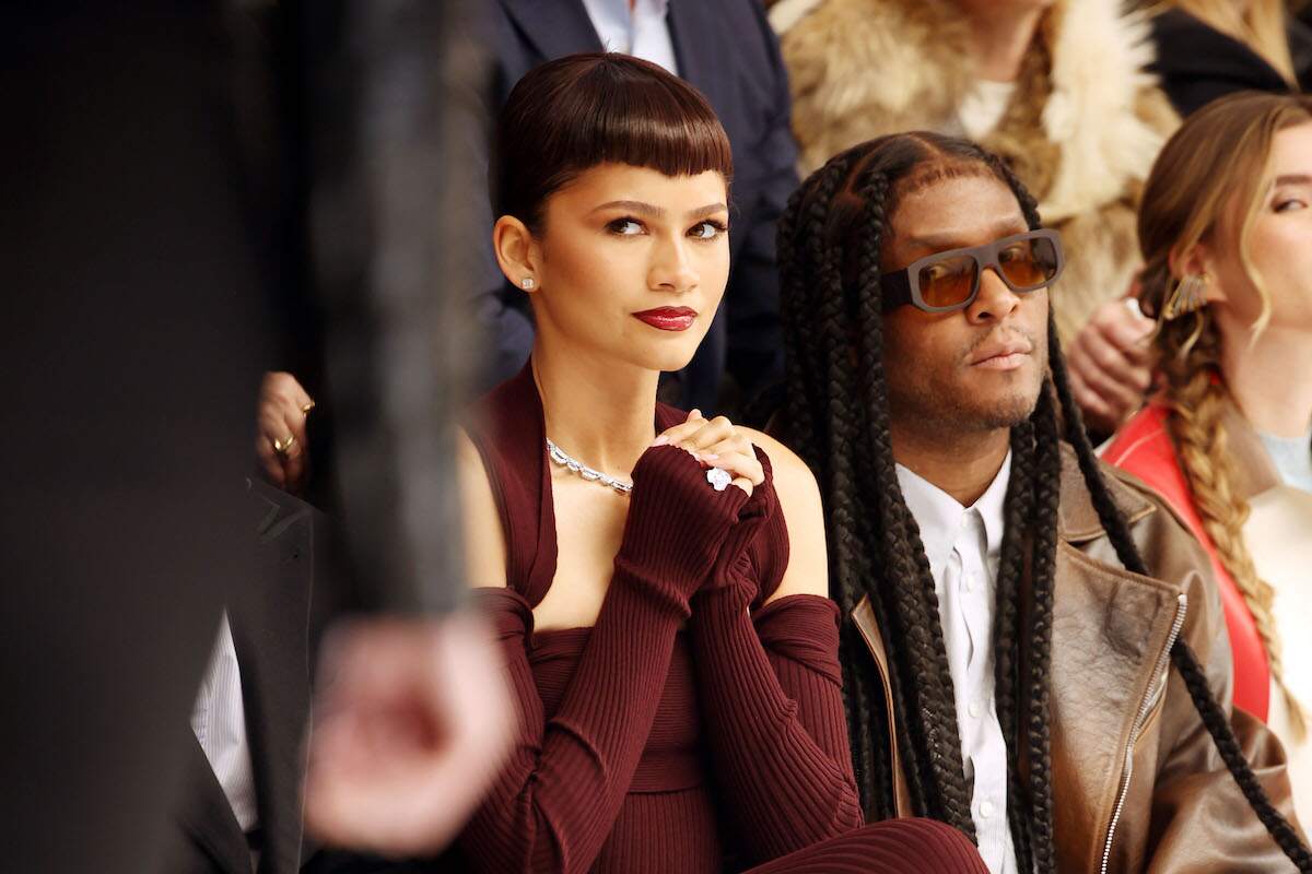 Zendaya wears a crimson dress and diamonds as she watches the Fendi Haute Couture Spring/Summer 2024 show from the front row