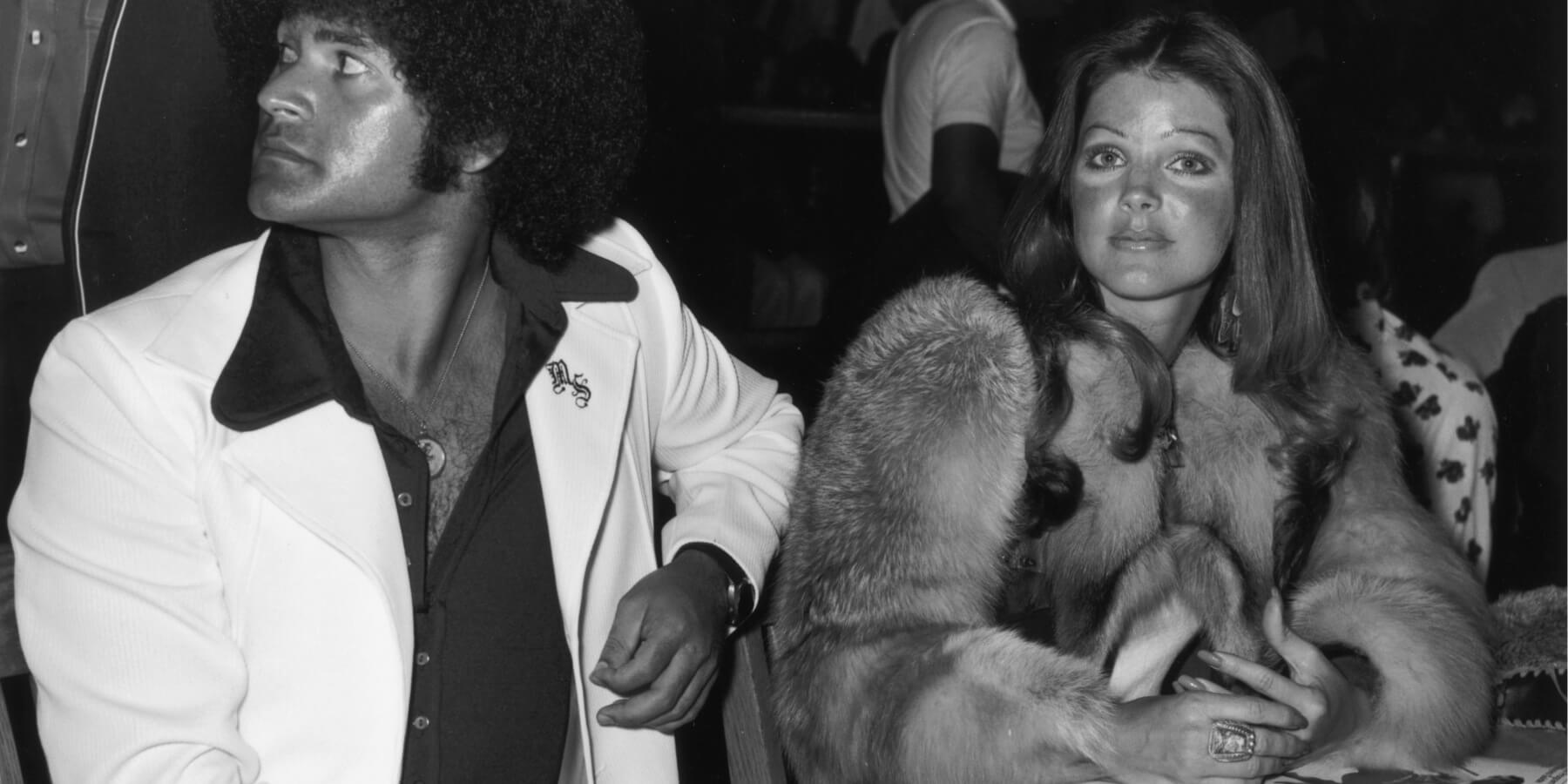 Mike Stone and Priscilla Presley photographed in 1975 at at a kung fu tournament at the Beverly Hills High School, California.