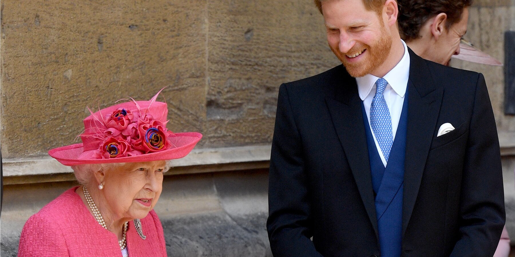 Queen Elizabeth laughs with grandson Prince Harry in a photo dated 2019.