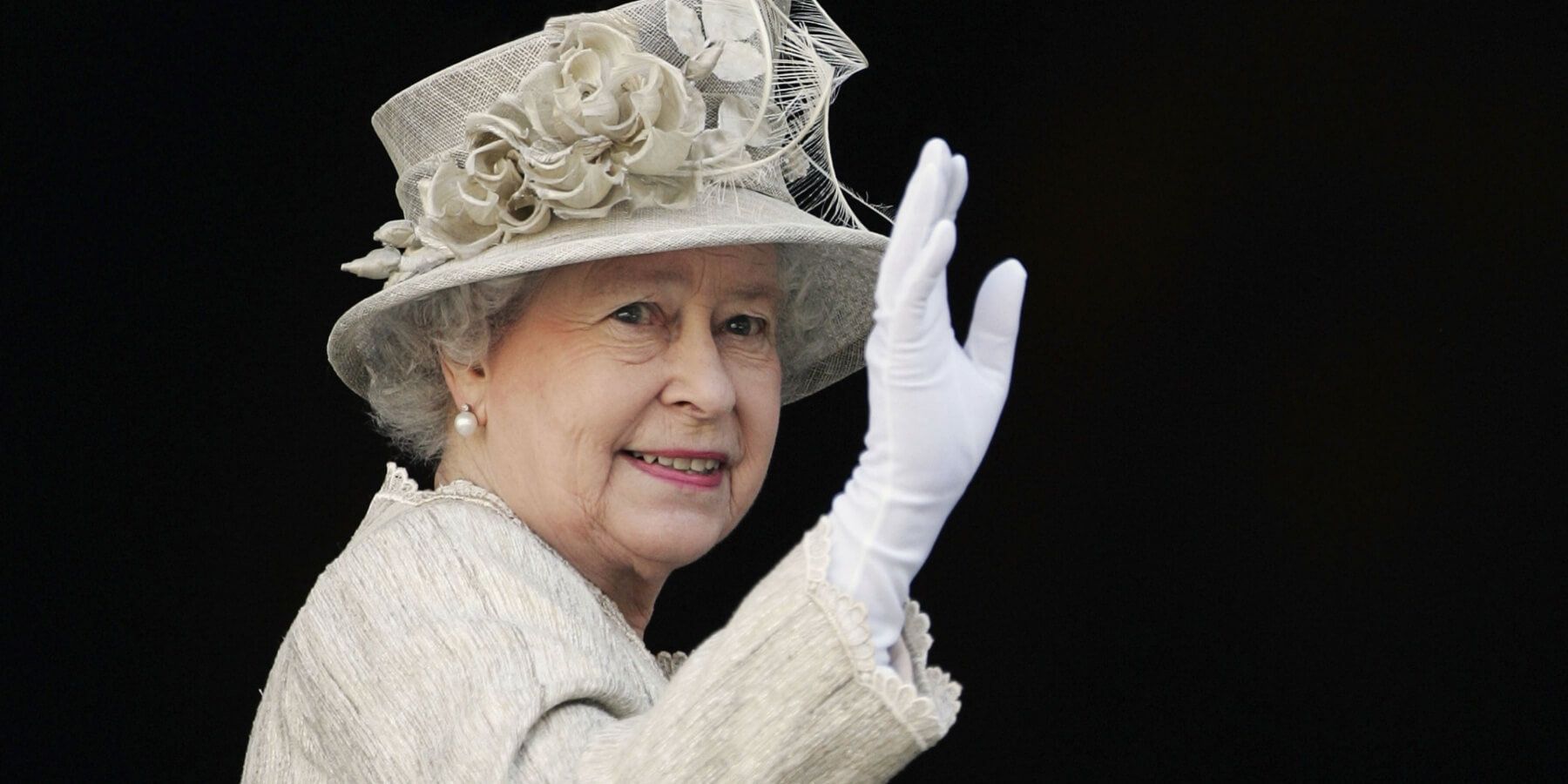 Queen Elizabeth waves to onlookers in 2006 in London, England.