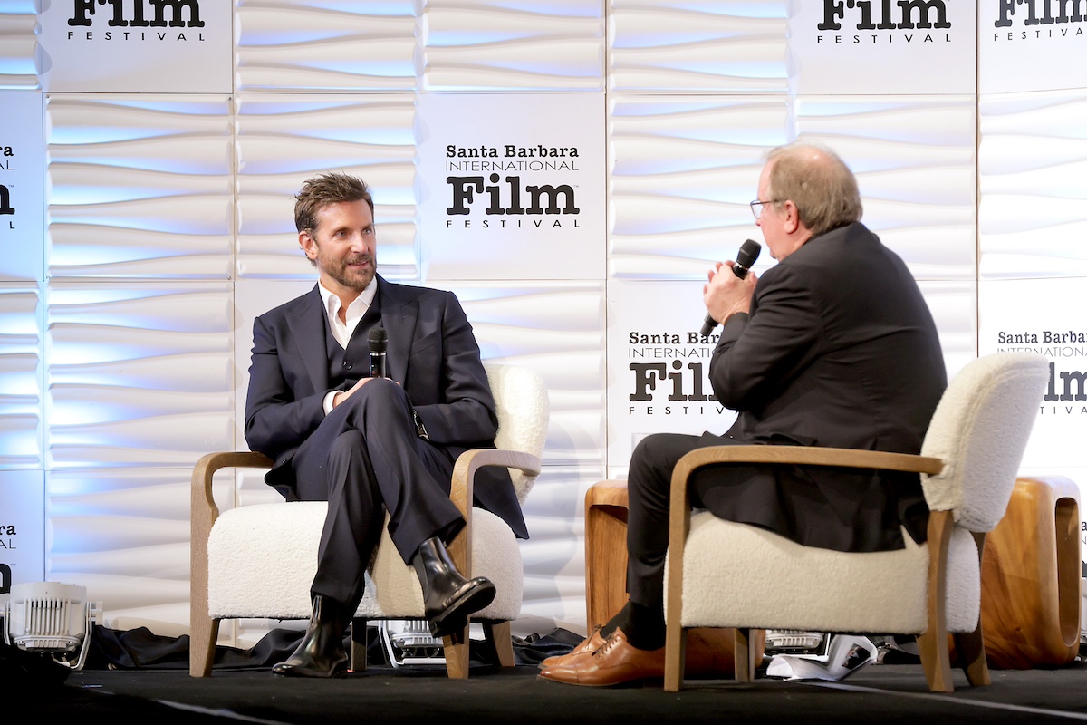 Bradley Cooper and Pete Hammond sitting on stage at the Santa Barbara International Film Festival
