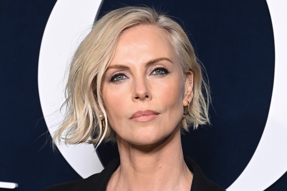 Charlize Theron posing at the the Christian Dior Womenswear Fall Winter 2023-2024 show.