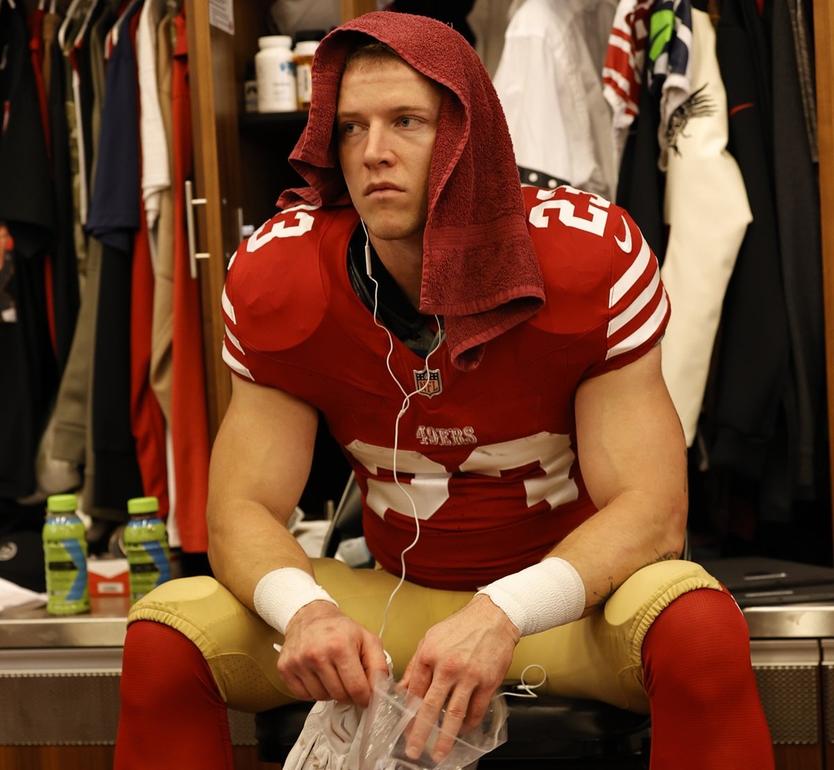 Christian McCaffrey #23 of the San Francisco 49ers in the locker room before the NFC Championship game against the Detroit Lions at Levi's Stadium
