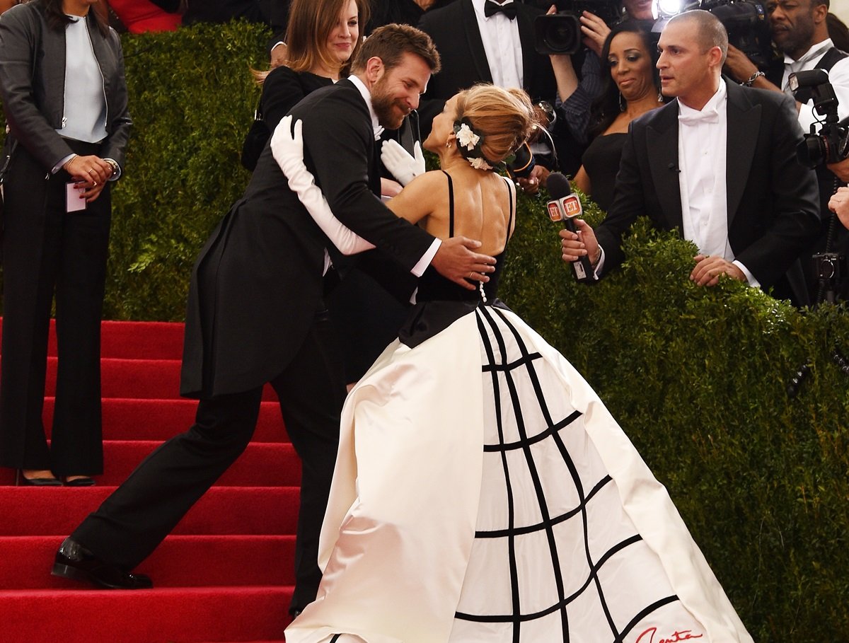 Bradley Cooper and Sarah Jessica Parker attend the "Charles James: Beyond Fashion" Costume Institute Gala at the Metropolitan Museum of Art on May 5, 2014 in New York City