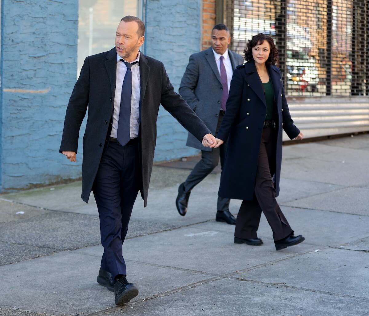 Donnie Wahlberg and Marisa Ramirez walking on an NYC sidewalk