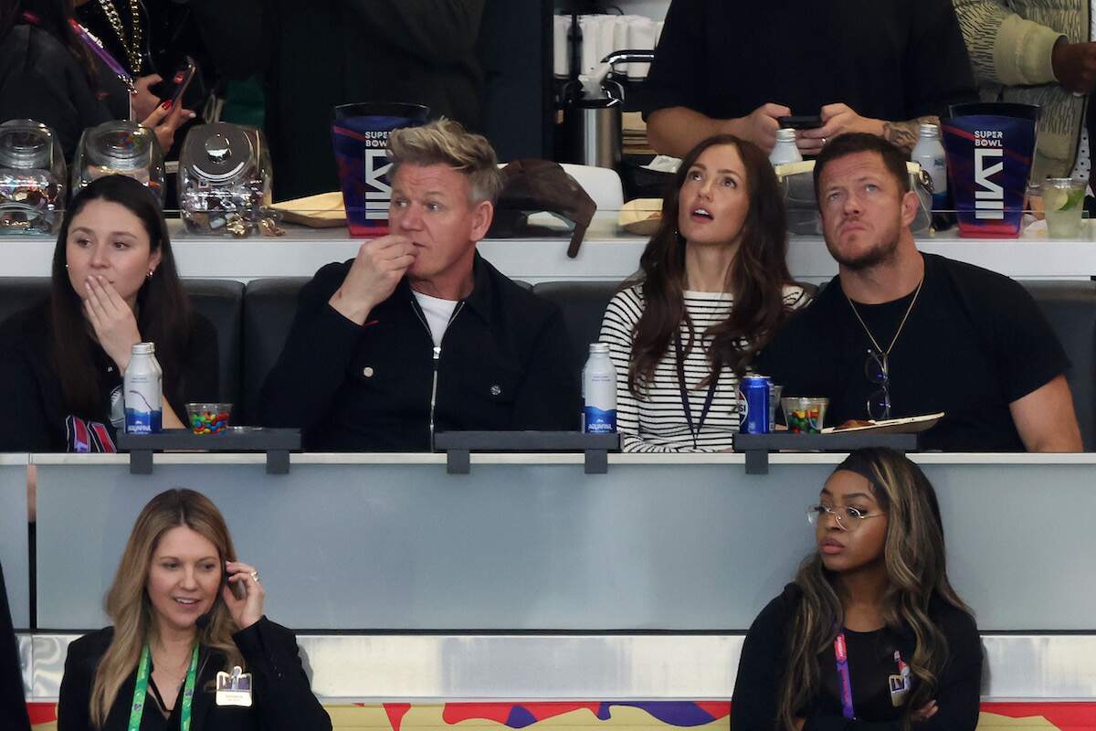 Celebrity chef Gordon Ramsay, actress Minka Kelly, and singer/songwriter Dan Reynolds look on in the first quarter during Super Bowl LVIII