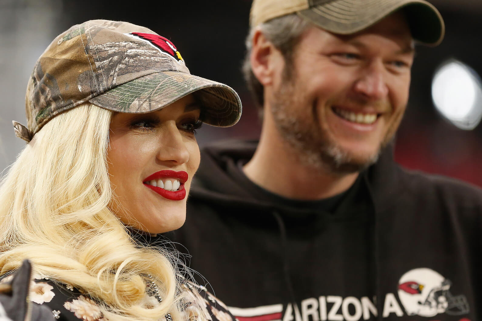 A close-up of Gwen Stefani and Blake Shelton attending the NFL game between the Green Bay Packers and Arizona Cardinals