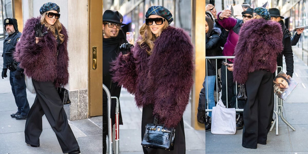 Actor/singer Jennifer Lopez wears a purple fur coat