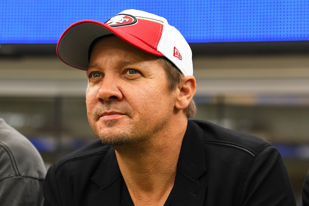 Jeremy Renner, who stars in a 2024 Silk Super Bowl commercial, looks on at a 2023 San Francisco 49ers game.