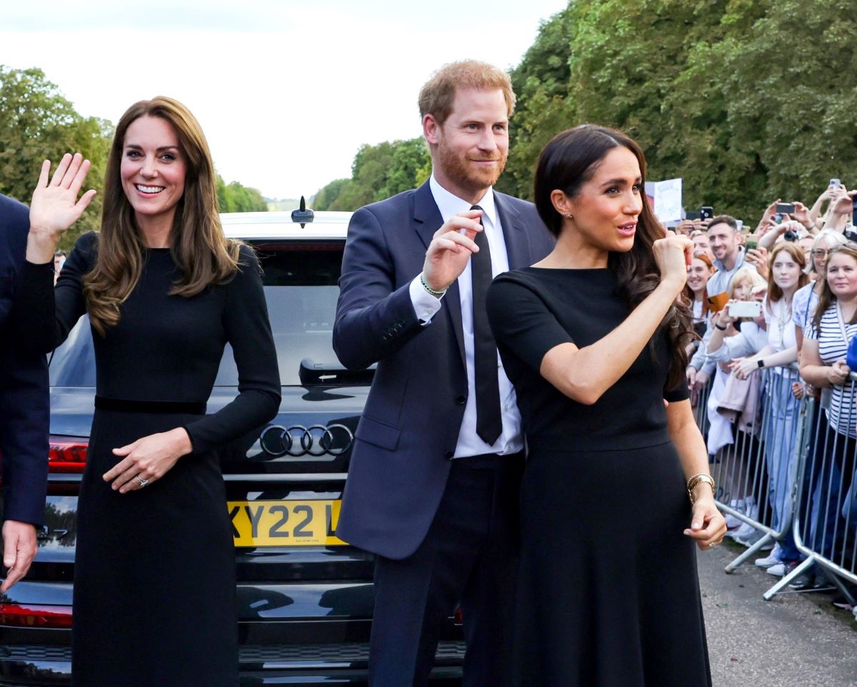 Kate Middleton, Prince Harry, and Meghan Markle wave goodbye following walkabout at Windsor Castle