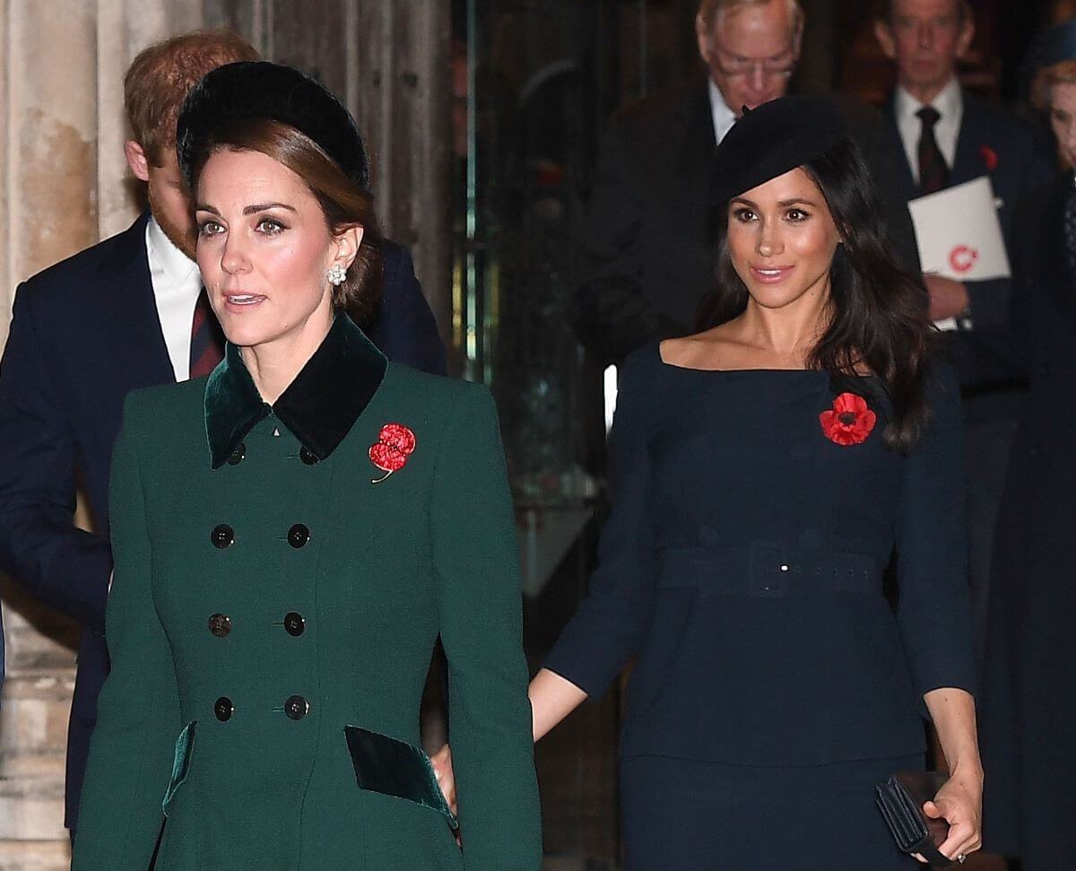 Kate Middleton and Meghan Markle leave after attending a service marking the centenary of WW1 armistice at Westminster Abbey