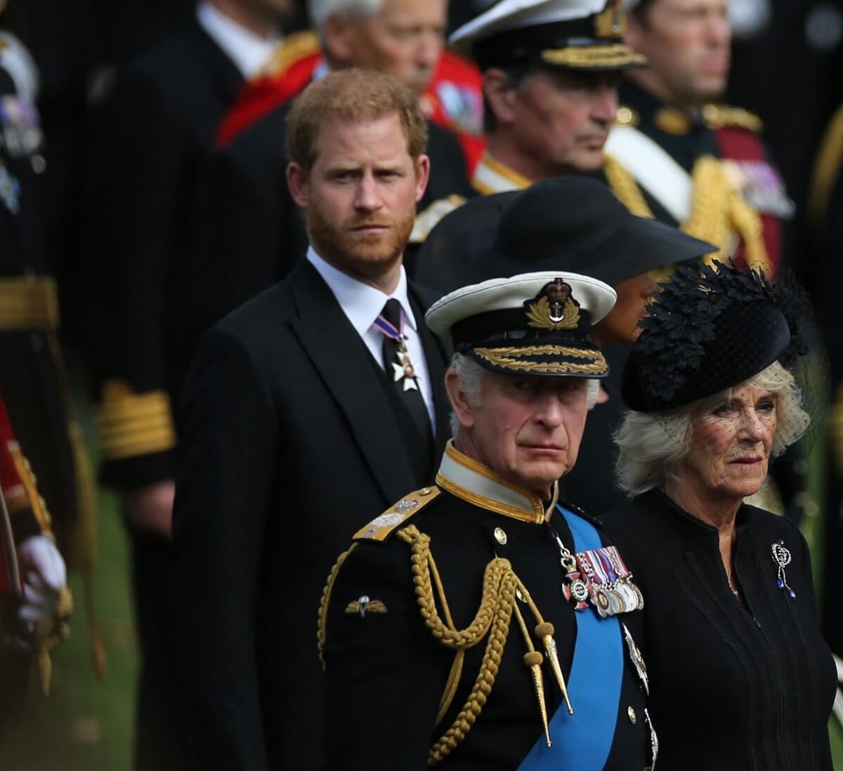 King Charles III, Queen Camilla, and Prince Harry look on following the State Funeral Service of Queen Elizabeth II