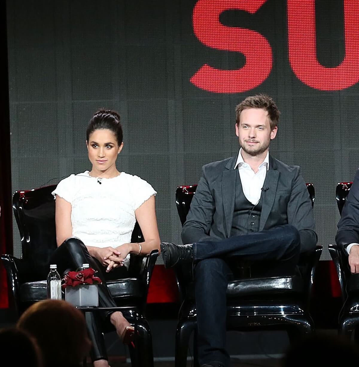 Meghan Markle and Patrick J. Adams onstage during the NBC Universal portion of the 2014 Winter Television Critics Association Press Tour