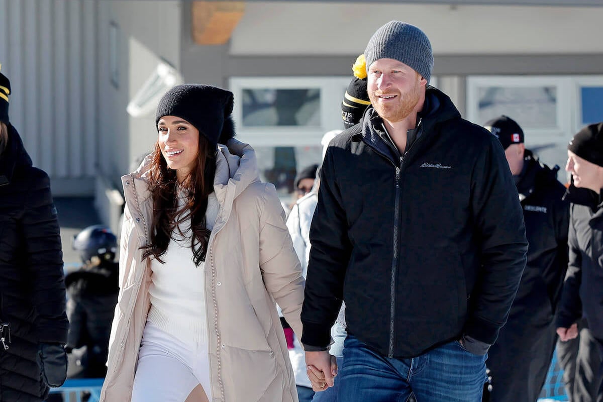 Meghan Markle and Prince Harry, who released a photo of them at the One Year to Go dinner for the 2025 Invictus Games, on a trip to Canada