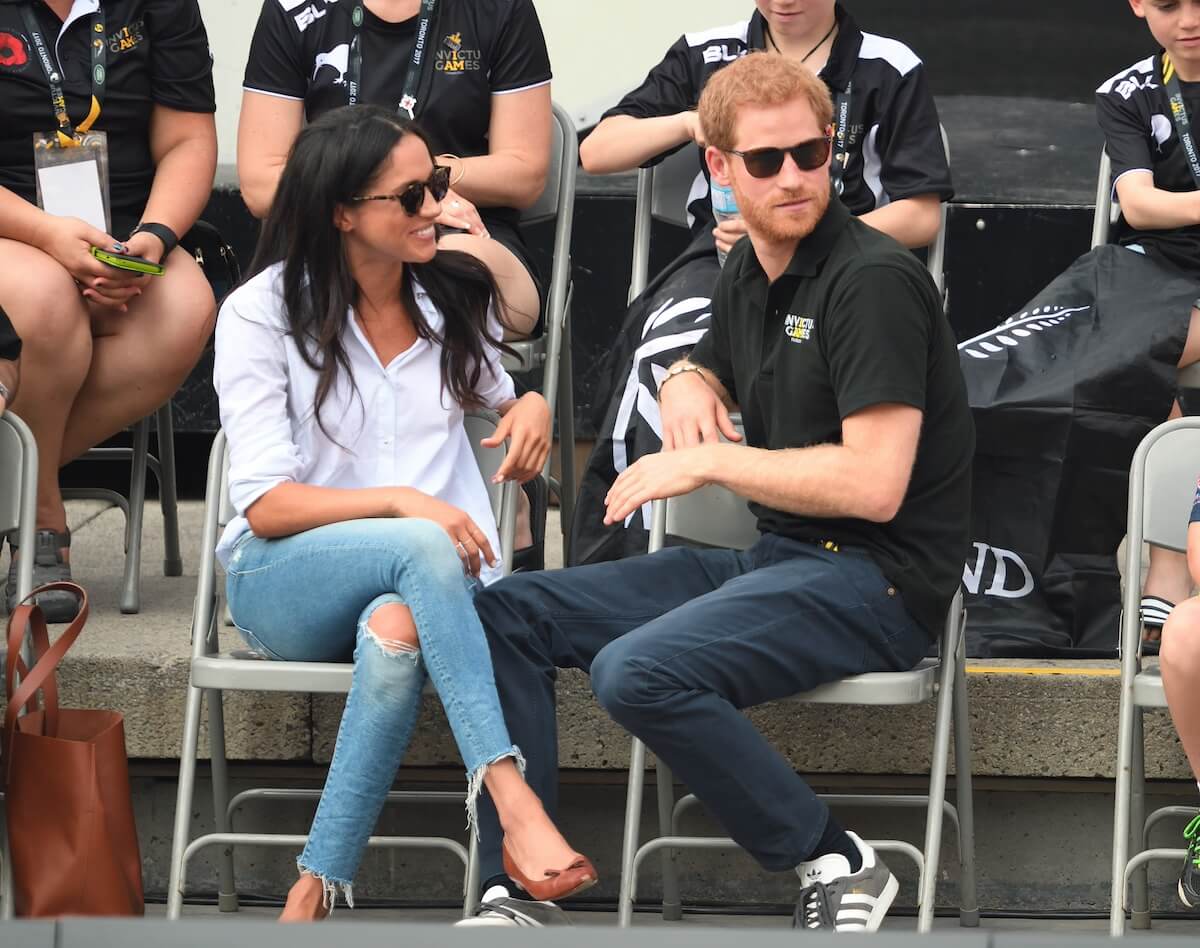 Meghan Markle keeps it casual with ripped jeans during one of her first appearances with Prince Harry in 2017