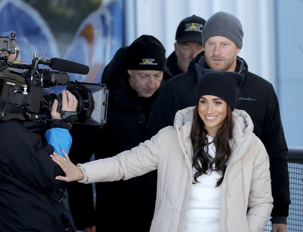 Meghan Markle touching cameraperson during Invictus Games Vancouver Whistlers 2025's One Year To Go Winter Training Camp in British Columbia