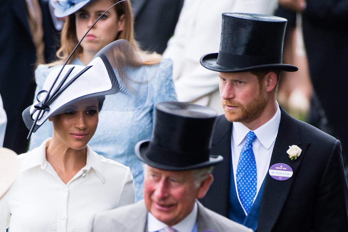 Meghan Markle, who didn't join Prince Harry to visit King Charles after cancer diagnosis, walks with Prince Harry and King Charles