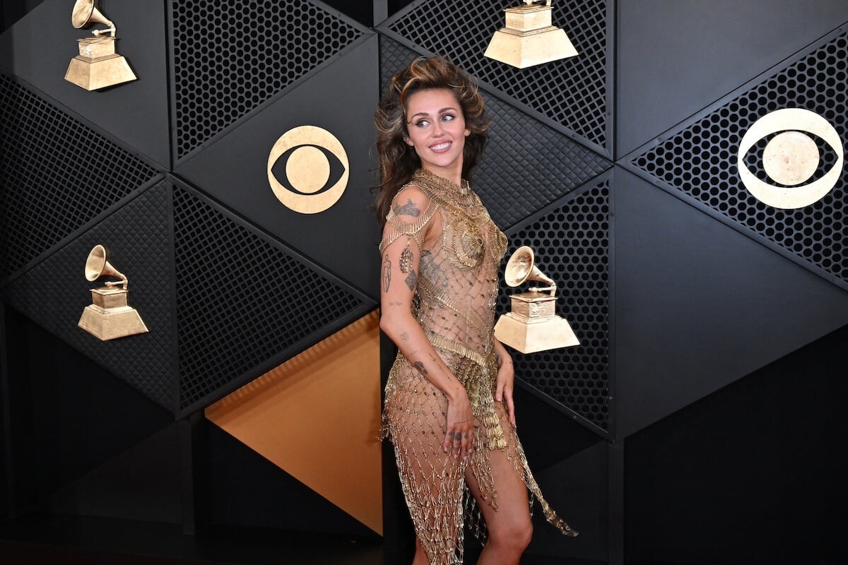 Miley Cyrus Turns Heads With Barely There Mesh Dress at 2024 Grammys