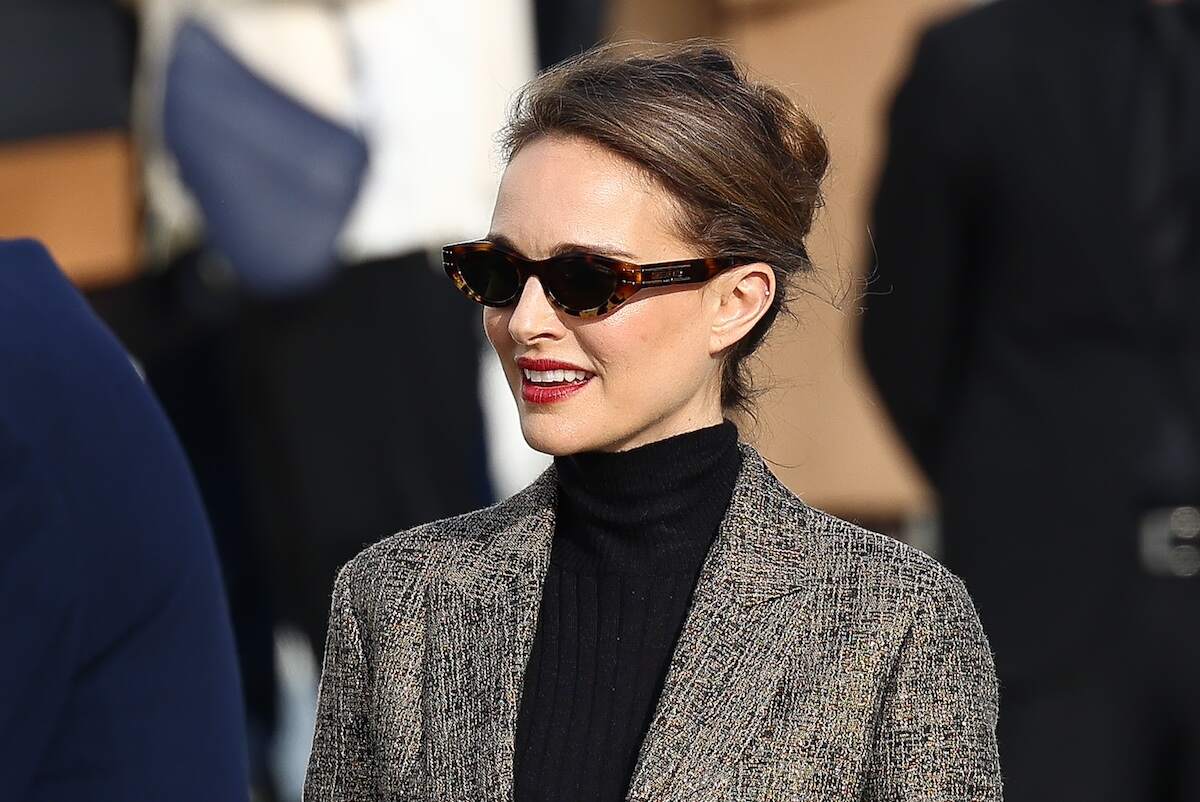 Actress Natalie Portman wears a black turtleneck and tweed business suit to the Christian Dior Womenswear Fall/Winter 2024-2025 show