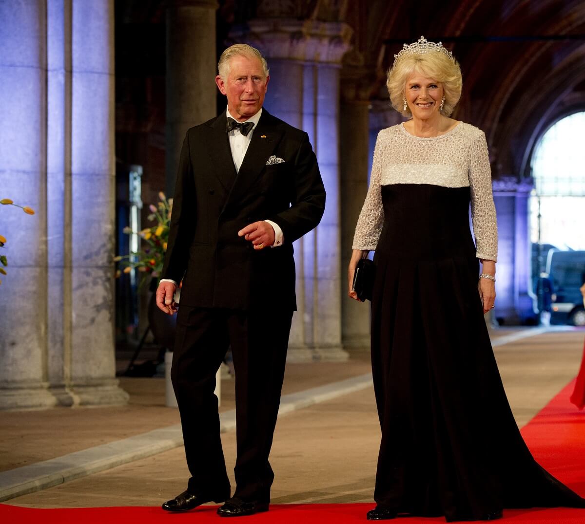 Now-King Charles III and Camilla Parker Bowles (now-Queen Camilla) attend a dinner hosted by Queen Beatrix of The Netherlands