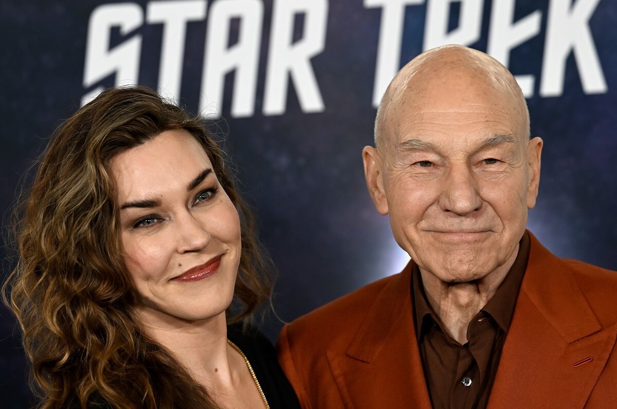 Patrick Stewart posing alongside wife Sunny Ozell at the premiere of "Star Trek: Picard" .