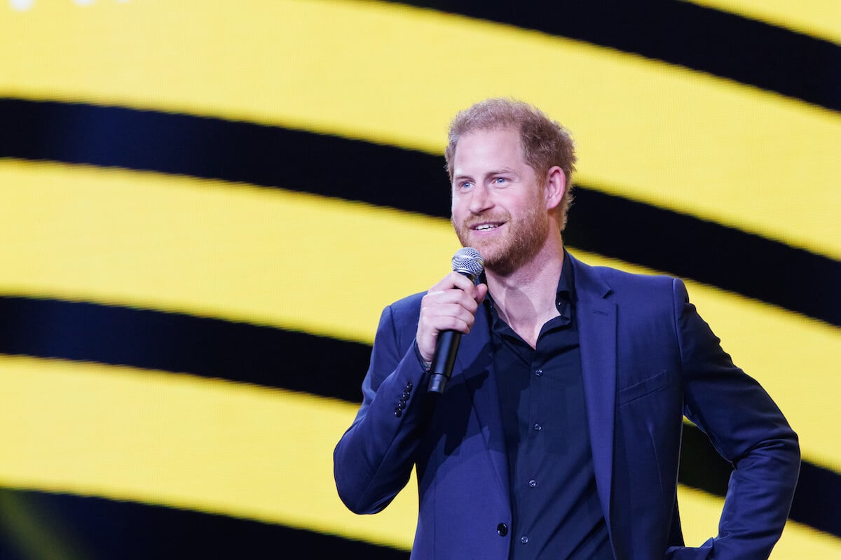 Prince Harry, who may sign a TV deal for the 2025 Invictus Games, holds a microphone at the 2023 Invictus Games