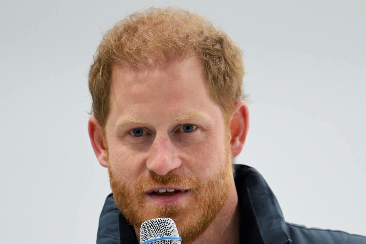 Prince Harry, who said illness 'brings families together,' at the One Year to Go celebrations for the 2025 Invictus Games speaking into a microphone.
