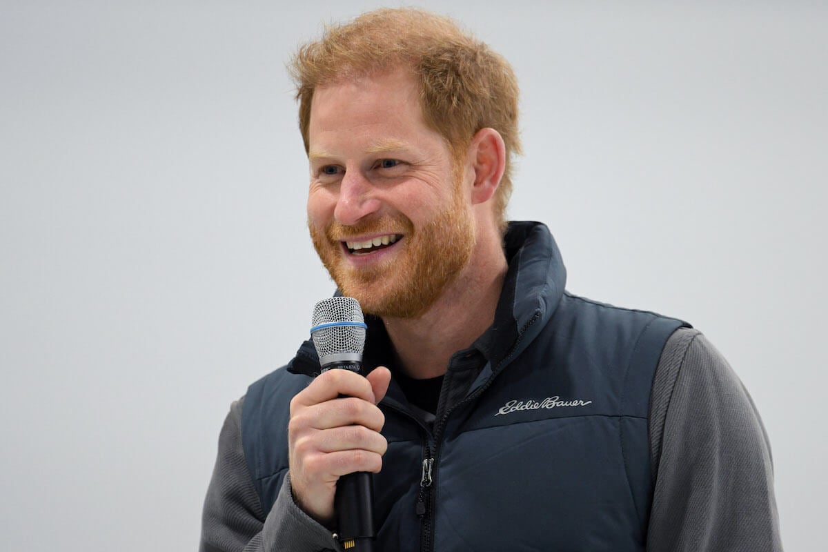 Prince Harry, whose Invictus Games documentary premiered on Hulu, holds a microphone