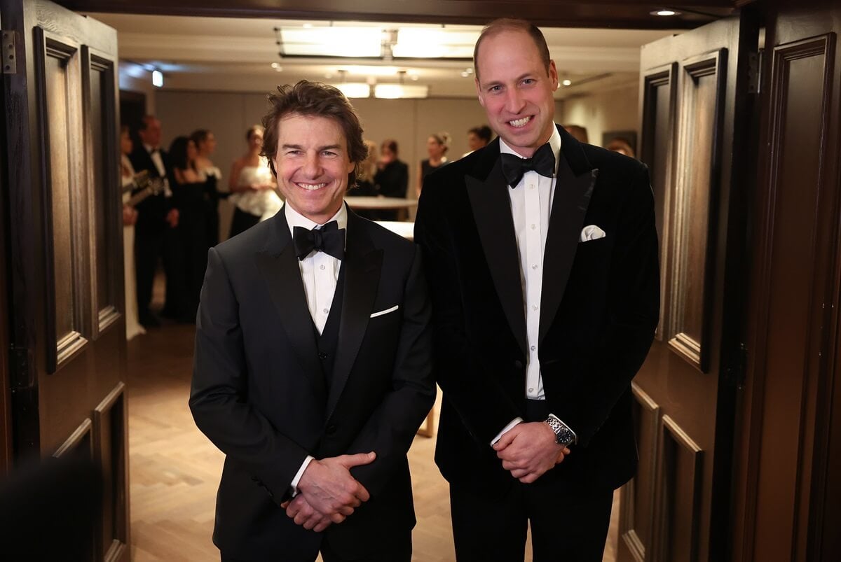 Prince William poses for a photo with actor Tom Cruise at the London Air Ambulance Charity Gala Dinner