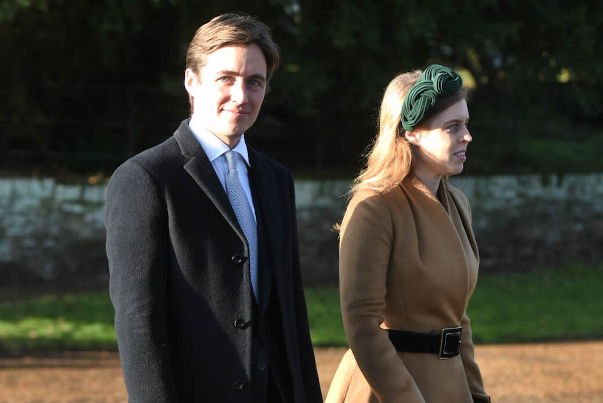 Princess Beatrice, who broke royal tradition after Meghan Markle attended the royal family's 2017 Christmas festivities, walks with her then-fiance Edo Mapelli Mozzi