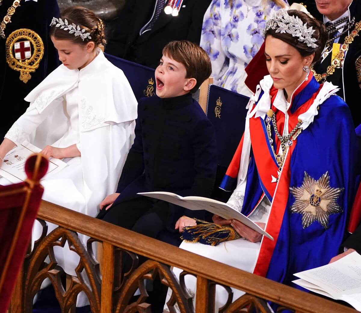 Princess Charlotte, Prince Louis, and Kate Middleton attend the Coronation of King Charles III and Queen Camilla at Westminster Abbey