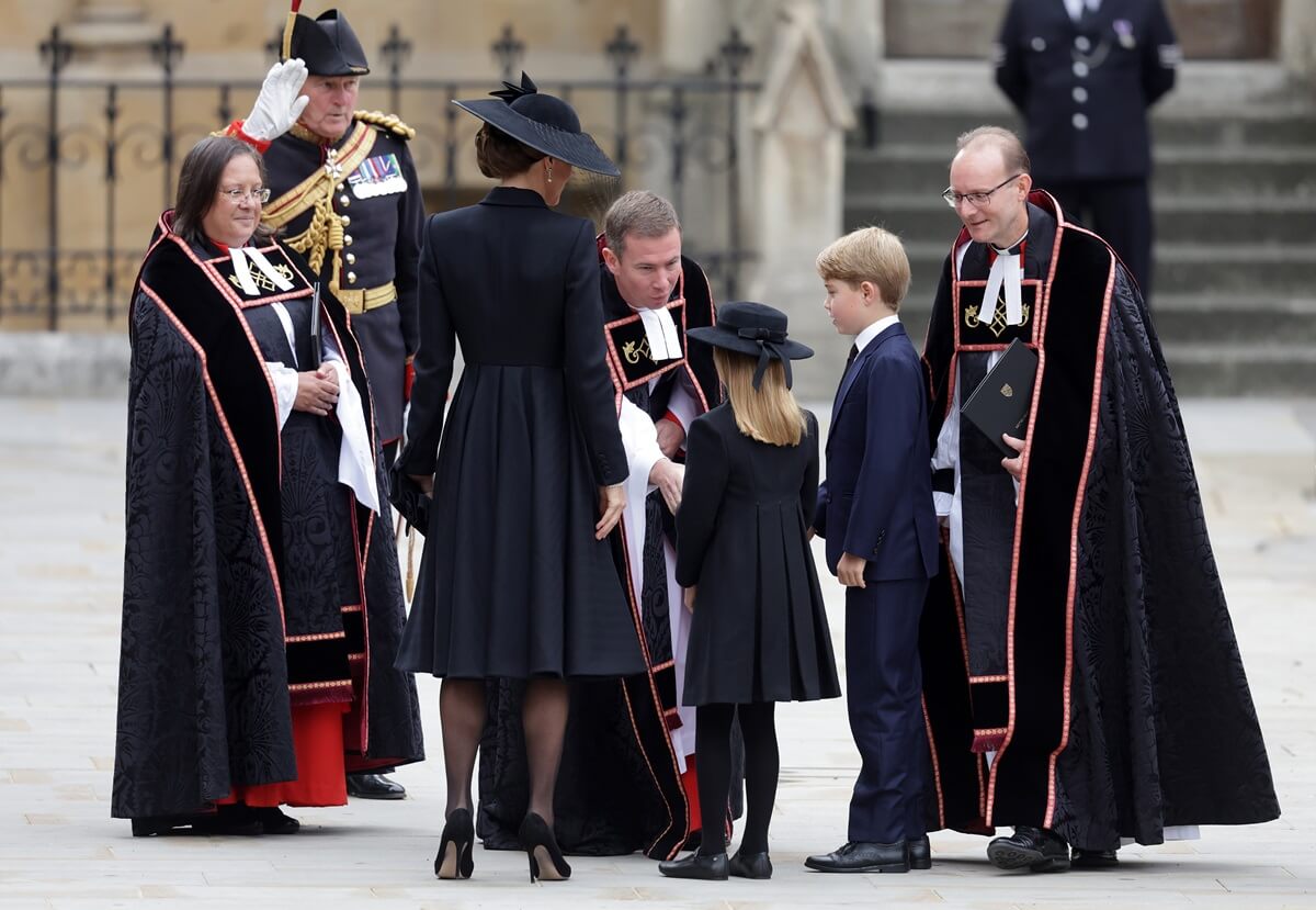 Princess Charlotte and Prince George arrive at Westminster Abbey for the state funeral of Queen Elizabeth II