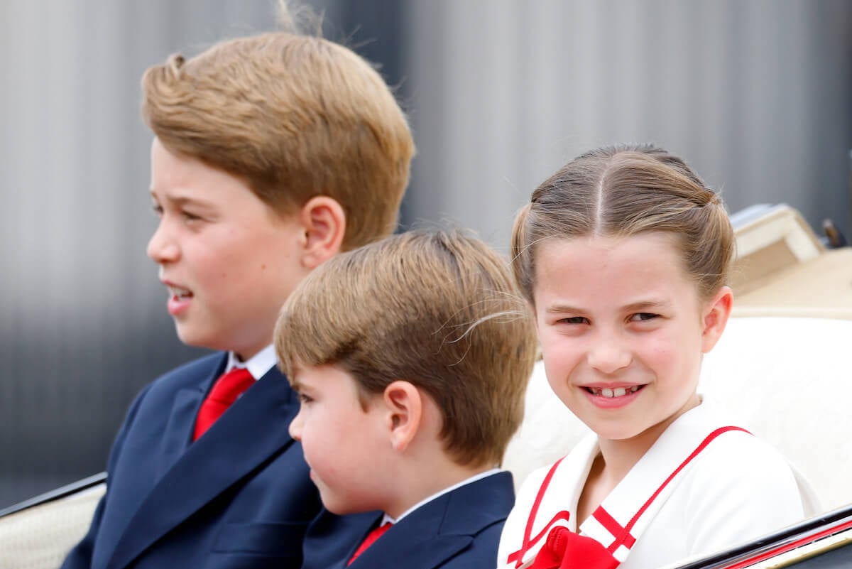 Princess Charlotte, who keeps her brothers 'in check,' sits with Prince George and Prince Louis