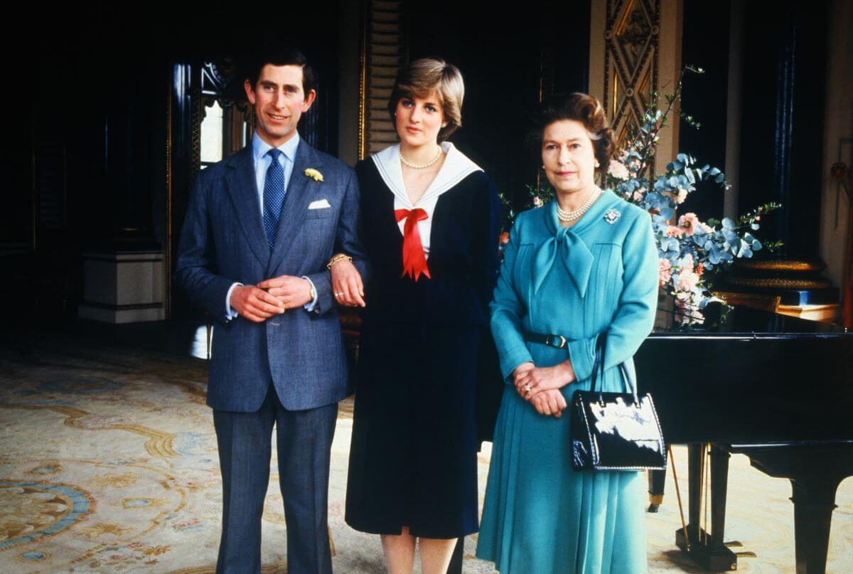 Princess Diana and then-Prince Charles pose with Queen Elizabeth at Buckingham Palace (circa 1981)