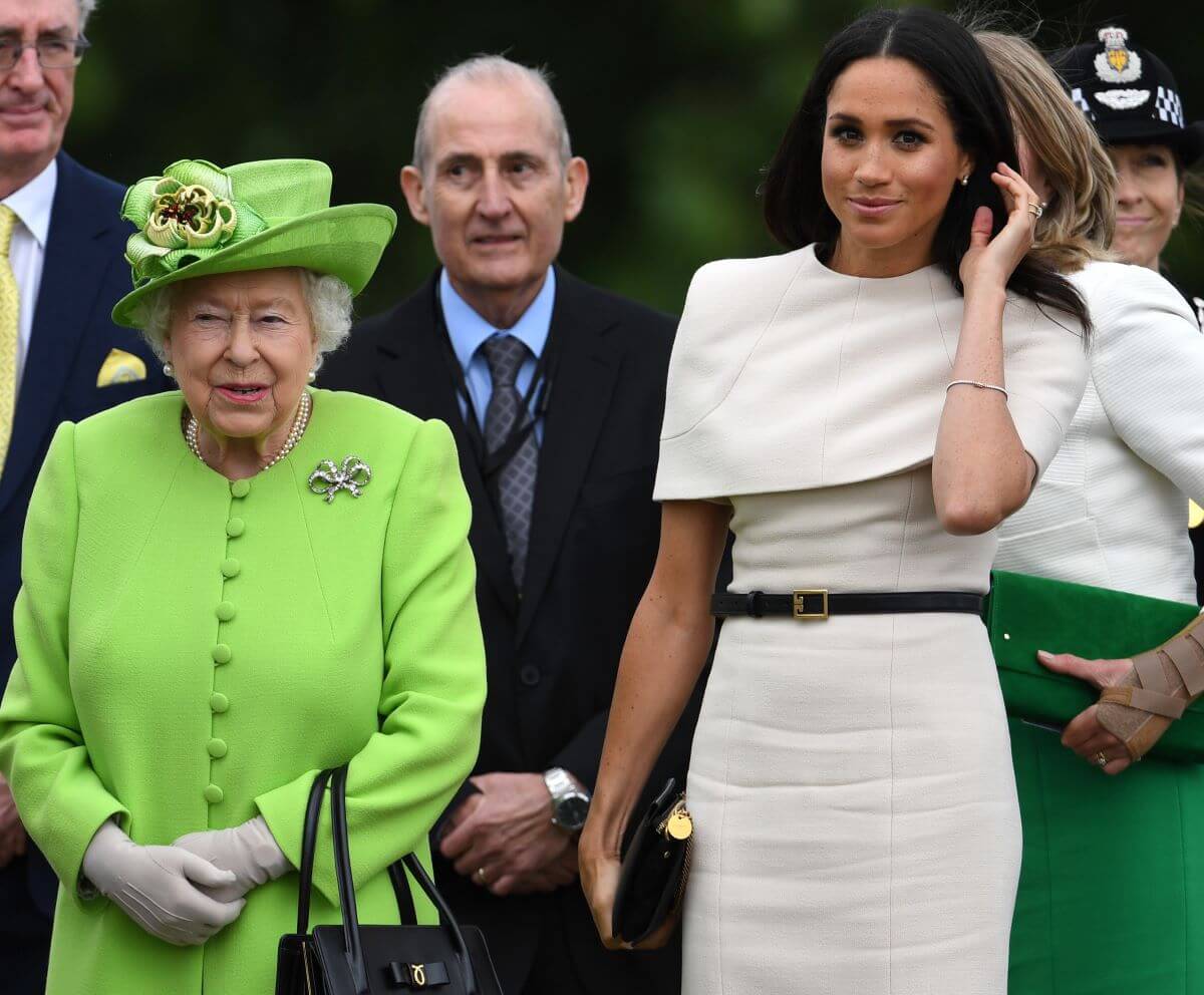 Queen Elizabeth II and Meghan Markle arrive to open the Mersey Gateway Bridge in the town of Widnes in Halton, Cheshire, England